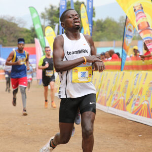 Joseph Juma (Deejay Trafford) as he crossed the 42KM finish line of the 2024 Kilimanjaro Marathon